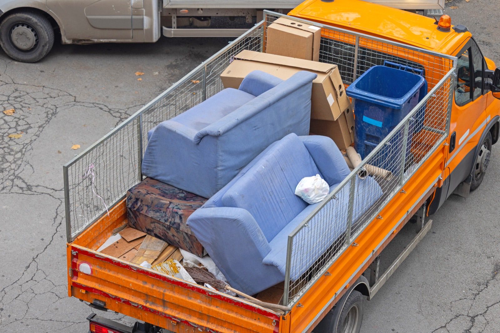 Old furniture and household junk loaded for hauling